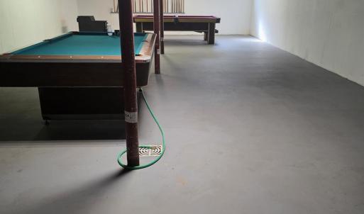 The full basement served as a "private pool hall" The tables can stay or be taken away at the new owners request.
