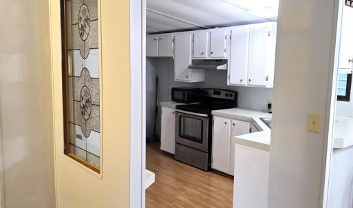 well appointed kitchen  with plenty of cabinet and counter space