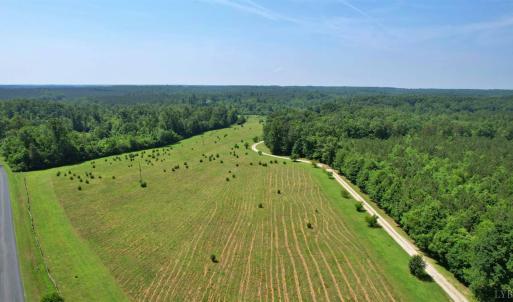 Aerial from road looking down the driveway