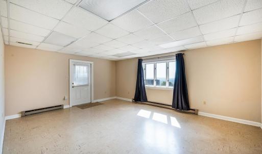 Home Office or Guest Room with Exterior Entrance adjacent to Rec Room