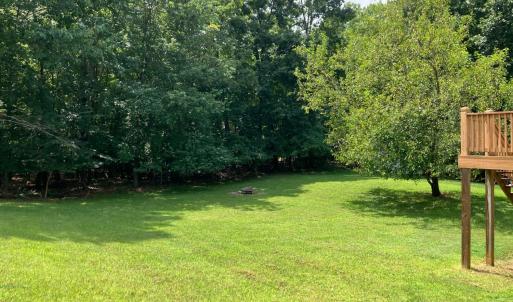 Large lot with level backyard/mature trees