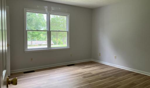 Bedroom 1 on Main level w/ walk in closet