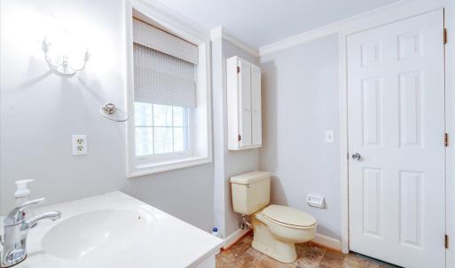 Lower Level Full Bath adjacent to potential 4th Bedroom