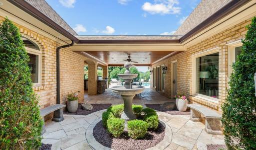 Outdoor bathroom in courtyard to accommodate pool
