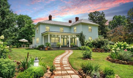Welcome home to this completely restored historic property, nestled on land once part of a 2000-acre orchard and farm.  Meandering to the rocking chair front porch, a path of hand-gathered fieldstones adds timeless character and connection to it's rich past!