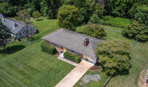 Aerial view of the front of the house and yard