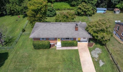 Aerial view of the front yard and house