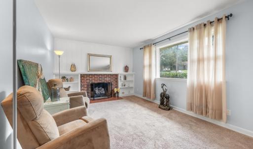 Living room with wood-burning fireplace