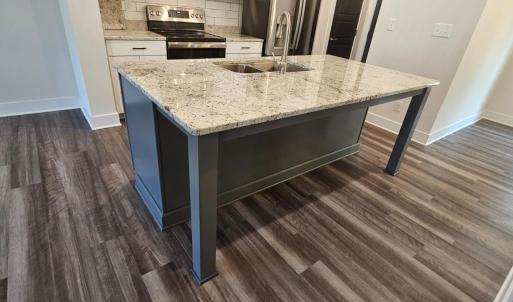 Kitchen island showing breakfast bar