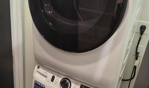 Stacked washer/dryer remain
