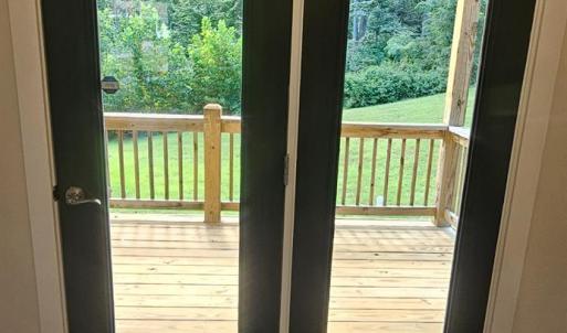 French doors in DR lead to covered deck