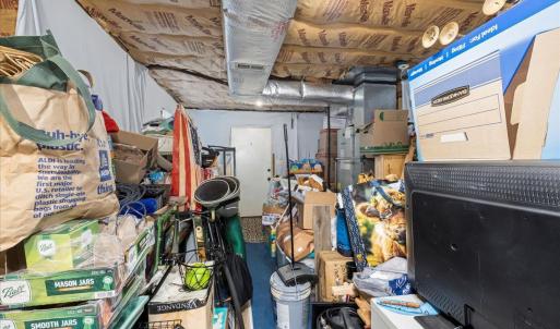 It looks full! But it is 15' of great storage space with an exterior door at the end which leads to the driveway!