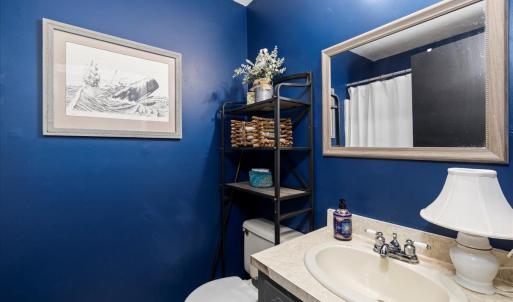 The hall full bath is the first thing you come to from the LR