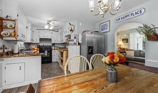 This galley kitchen packs so many cabinets!!! Including a custom made unit by the seller's brother!