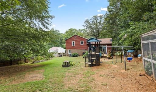 .6334 of an acre lot! Recently surveyed. Almost completely fenced. The chicken coop and enclosure do NOT convey