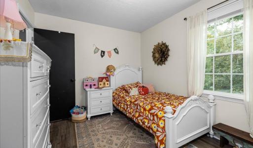 All the bedrooms and the 2 full baths are located on this level just up from the LR