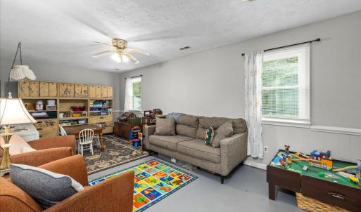 Above ground large bright den on the lower level