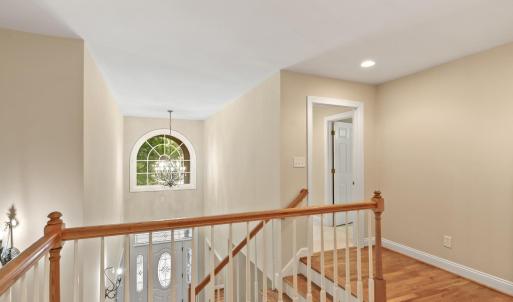 Looking towards second bedroom with private full bathroom