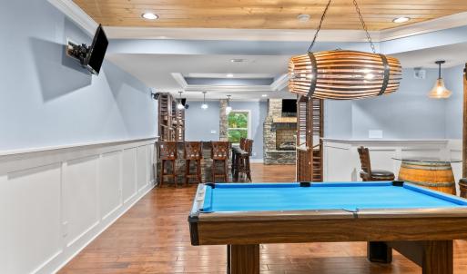 More tongue and groove ceiling over pool table area
