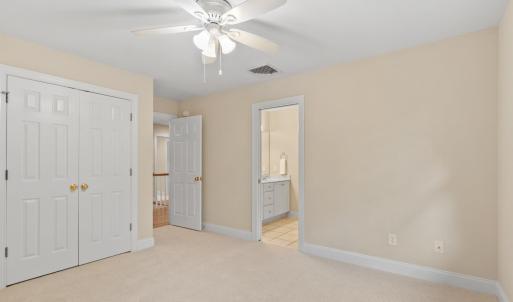 Bedroom #4 with walk-in attic access through closet
