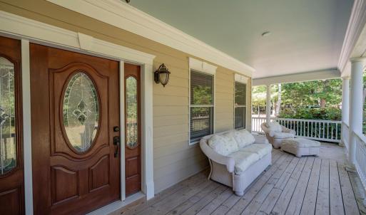 Front porch is L-Shaped and includes a side porch