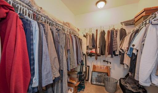 Walkin closet in primary bedroom