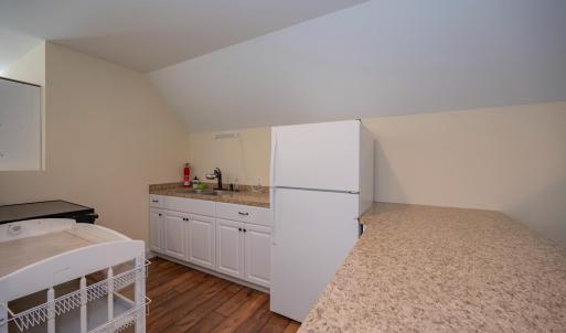 Kitchen in finished area above garage
