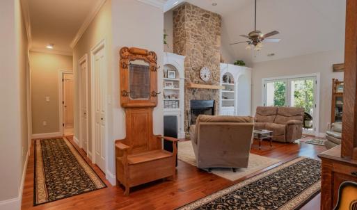 Hallway to left  has 2 bedrooms & full bath, great room to right