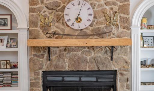 Rock woodburning FP in Greatroom