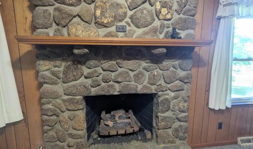 Remote for Gas FP on Right side of Mantel and Electrical outlet over Mantel