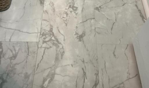 New vinyl plank flooring in bath.