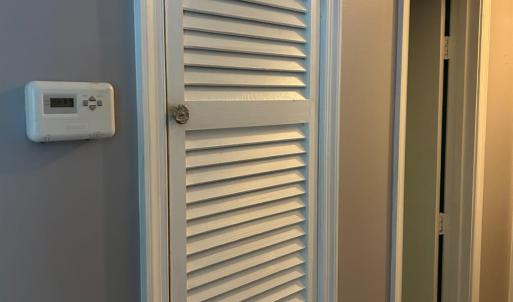 Linen closet in hall.