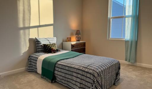 This room can easily hold a queen