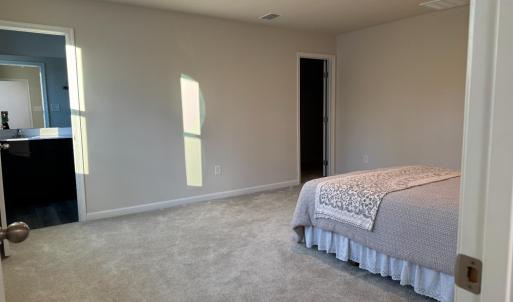 The door on the right in the corner is the huge walk-in closet. the door on the left is the pretty bathroom