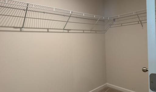 Huge 10'10'x5'5" primary suite closet