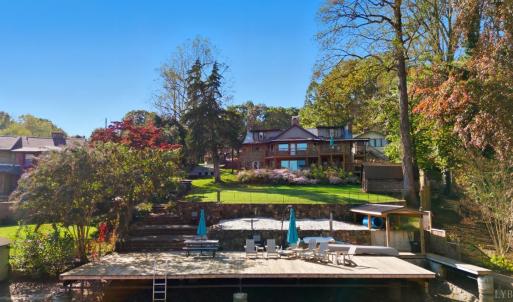 Property View from Timberlake shows docks, front yard & Beautiful Home