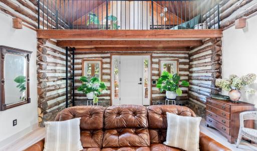 LIVING ROOM TO ENTRANCE DOOR WITH READING KNOOK above Front  DOOR