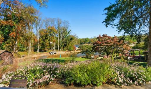 LOWER LEVEL PATIO VIEW TO DOCK & TIMBERLAKE