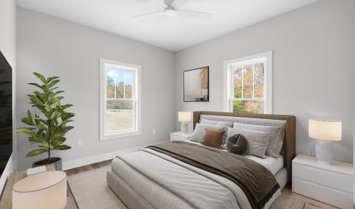 Bedroom #3 right of second full bath (Virtually Stagged)