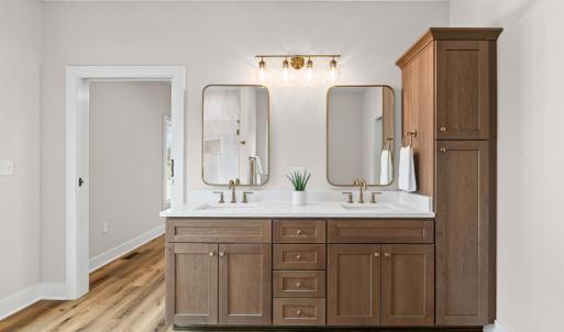 Primary Bathroom with lots of cabinet space.  No builder grade here!