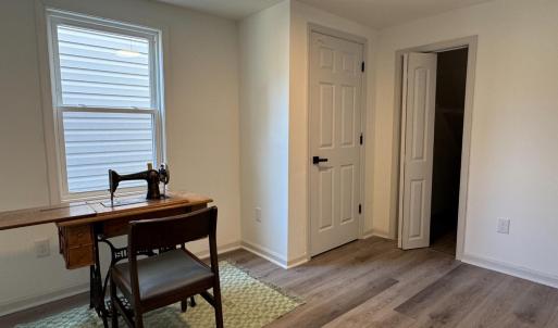 This room has 2 closets: 1 shown here, the doorway is under the stairs storage.