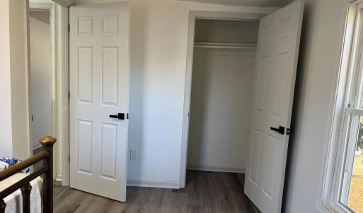 Bedroom 3 closet and door to hallway