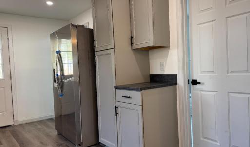 Door to the downstairs full bath on the right.