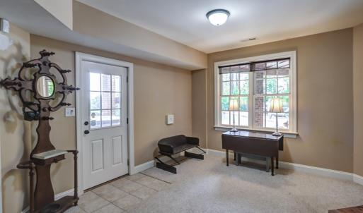 Terrace level den with walkout to pool and hot tub!