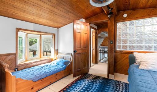 UPPER LEVEL BEDROOM ACCESSED BY CAT WALK