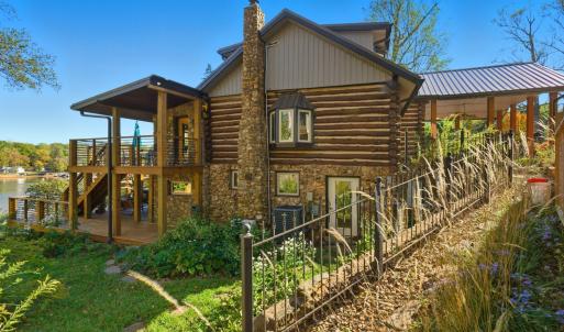 SIDE VIEW FROM DRIVE TO DECK & LOWER LEVEL PATIO