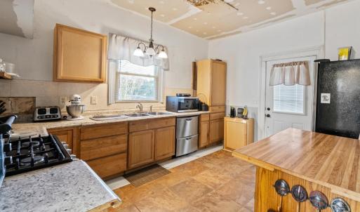 The driveway side door. Result of the leak in the back roof, as described~ it needs to be replaced