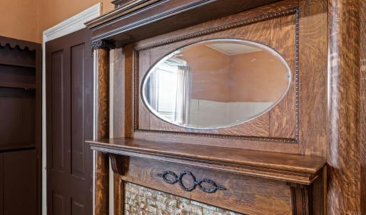 Another beautiful mantle. Showing here also is a regular sized closet and a hutch type closet on the driveway side wall.