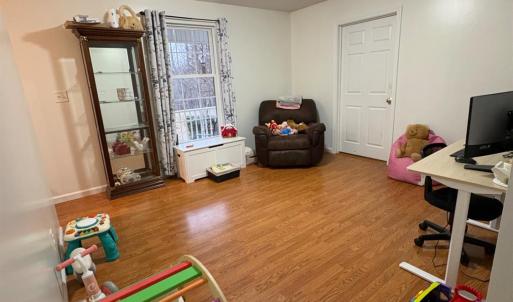 This room on main level is currently being used as a office.  Could also be used a den.