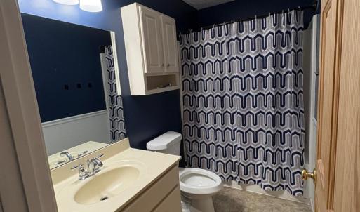 bath off upstairs bedroom.